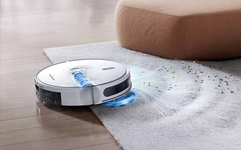 Robot aspirador Honiture T10 detectando y subiendo a una alfombra, aumentando automáticamente la potencia de succión.